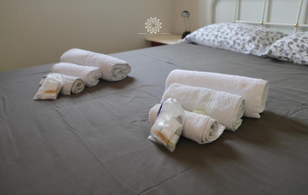 Postel nebo postele na pokoji v ubytování Casa Lucia
