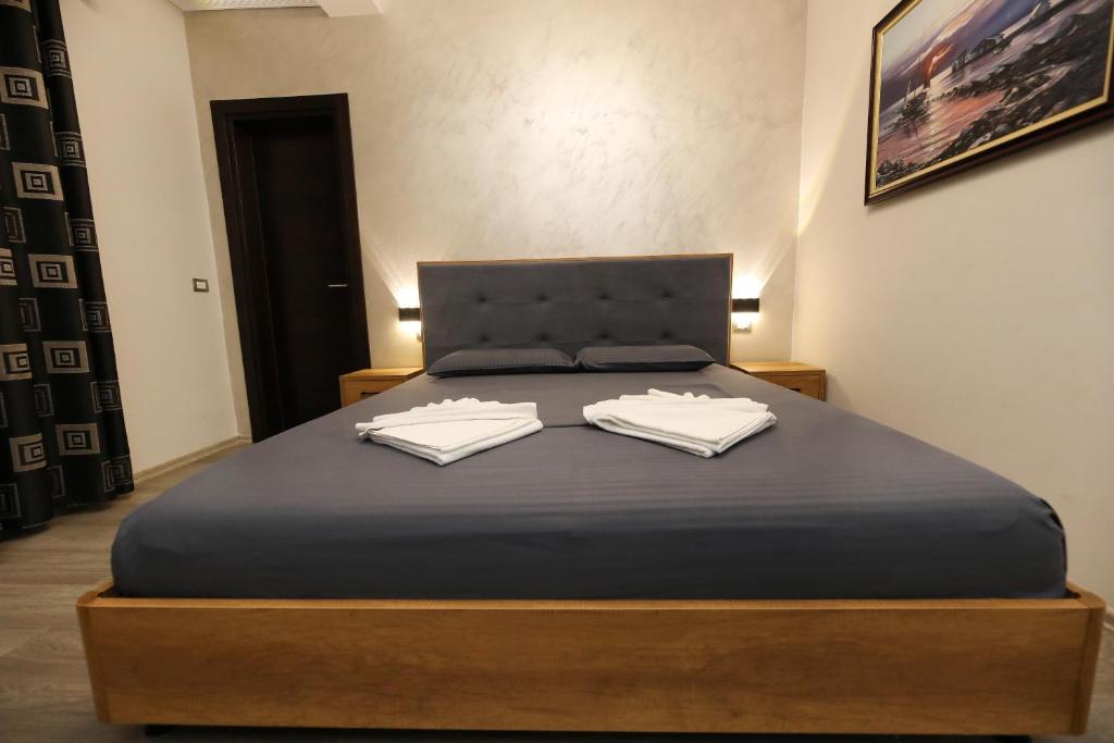 Postel nebo postele na pokoji v ubytování Hotel Salvadore