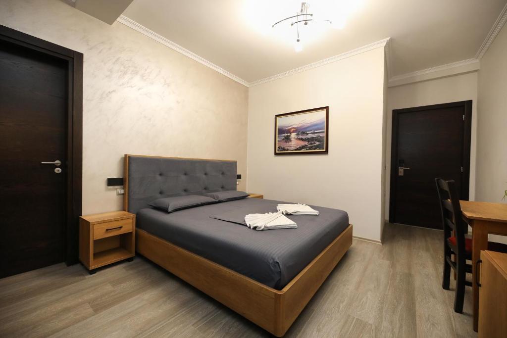 Postel nebo postele na pokoji v ubytování Hotel Salvadore