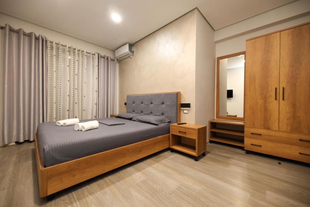 Postel nebo postele na pokoji v ubytování Hotel Salvadore