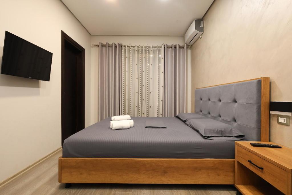 Postel nebo postele na pokoji v ubytování Hotel Salvadore