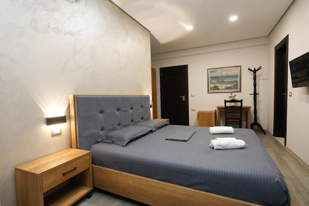 Postel nebo postele na pokoji v ubytování Hotel Salvadore