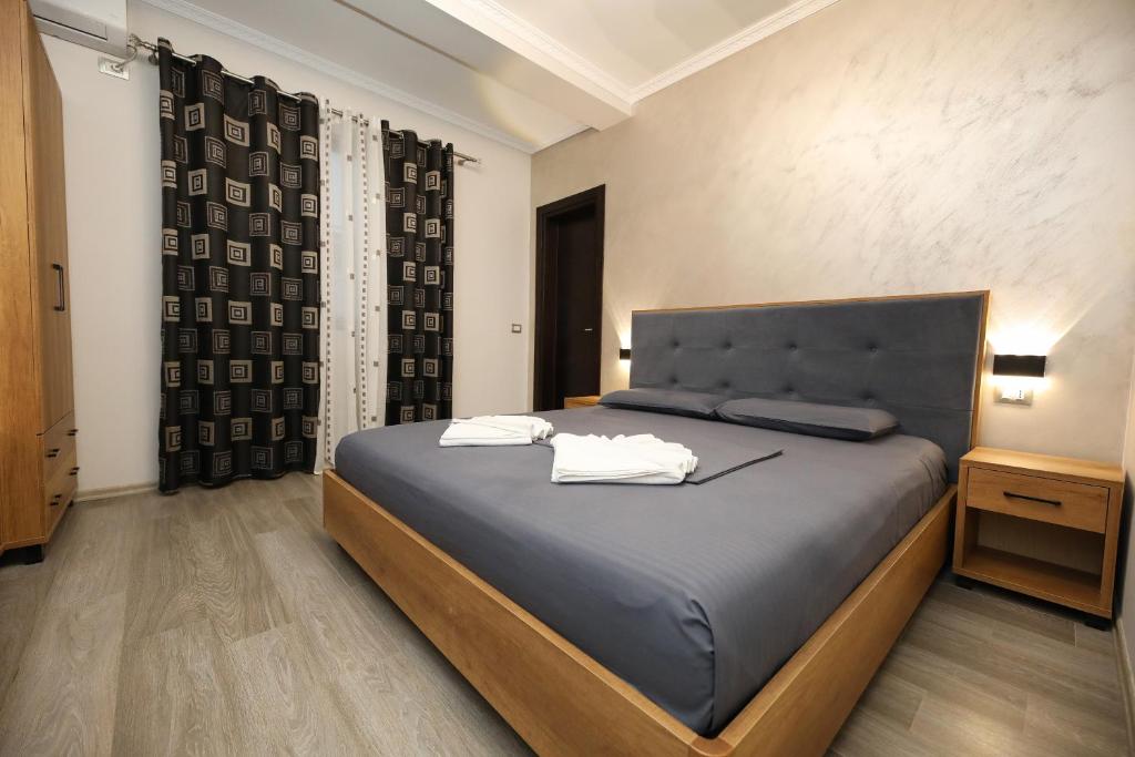 Postel nebo postele na pokoji v ubytování Hotel Salvadore