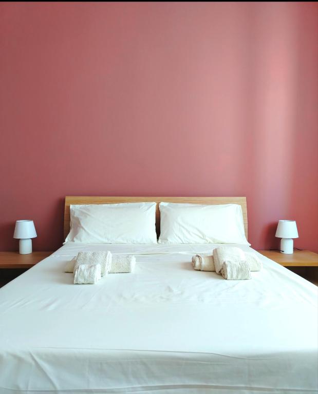 Postel nebo postele na pokoji v ubytování Torres Rooms Sassari