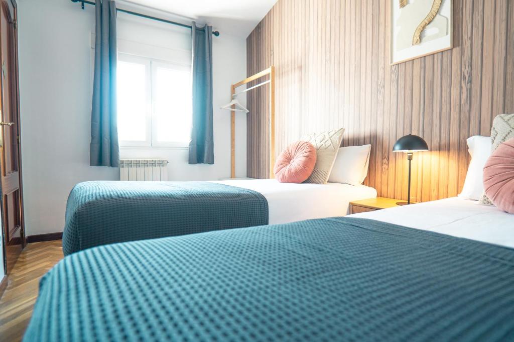 Postel nebo postele na pokoji v ubytování Smartr Madrid Chueca