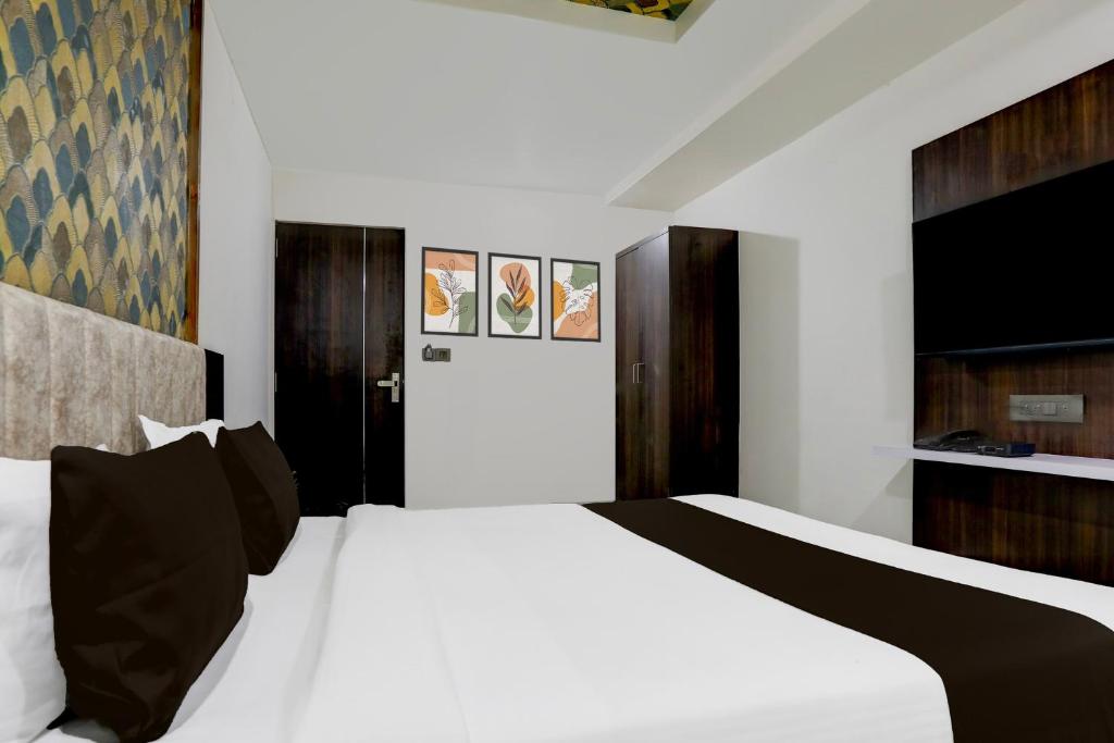 Postel nebo postele na pokoji v ubytování Super Hotel O Nana Chiloda Near Airport Formerly Green Valley