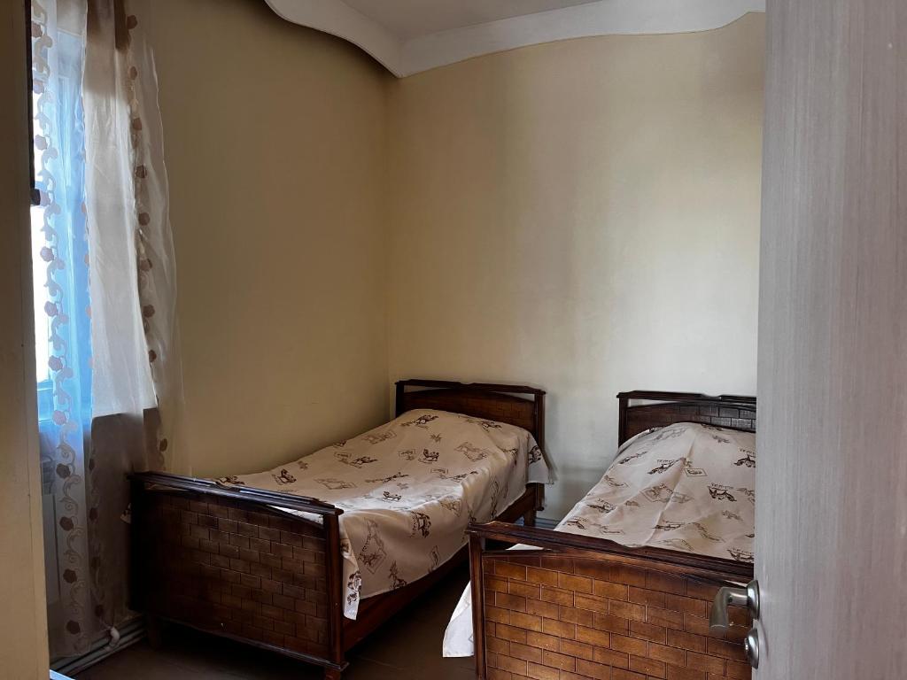 Postel nebo postele na pokoji v ubytování Vage Gest House