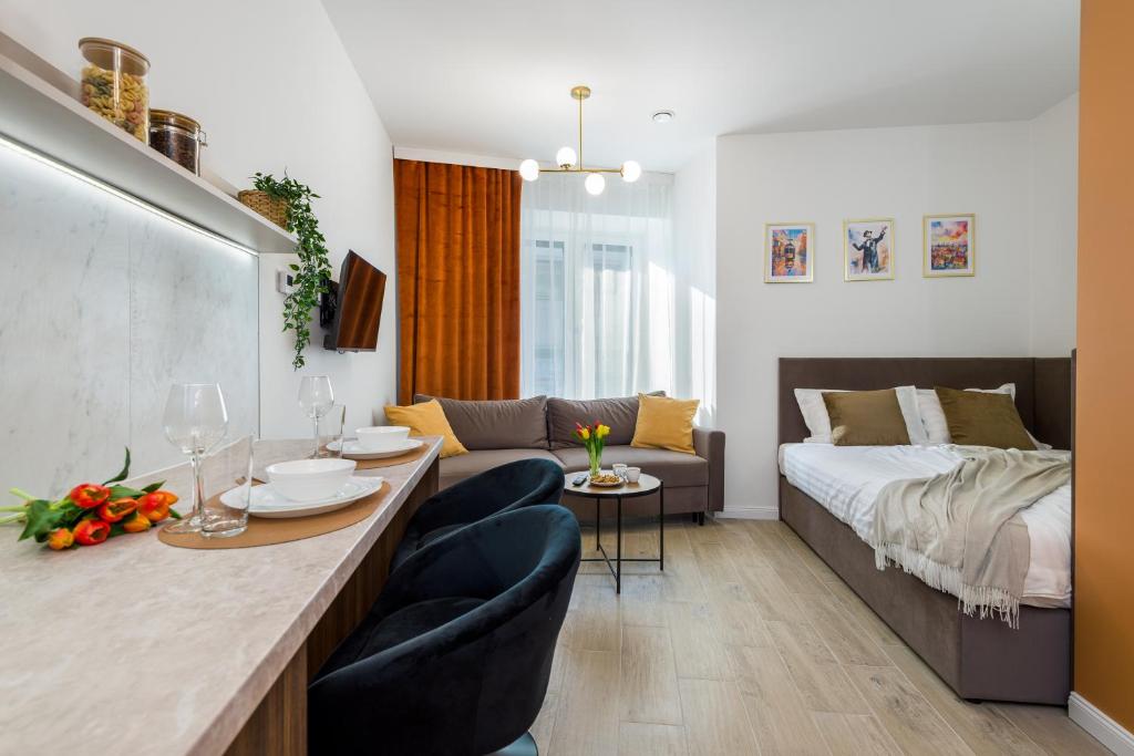 Postel nebo postele na pokoji v ubytování Harbor Apartments - Sosnowiec