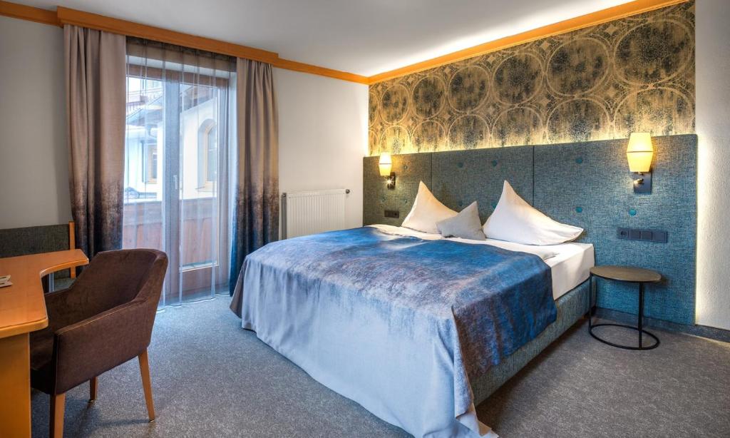 Postel nebo postele na pokoji v ubytování Hotel Königgut