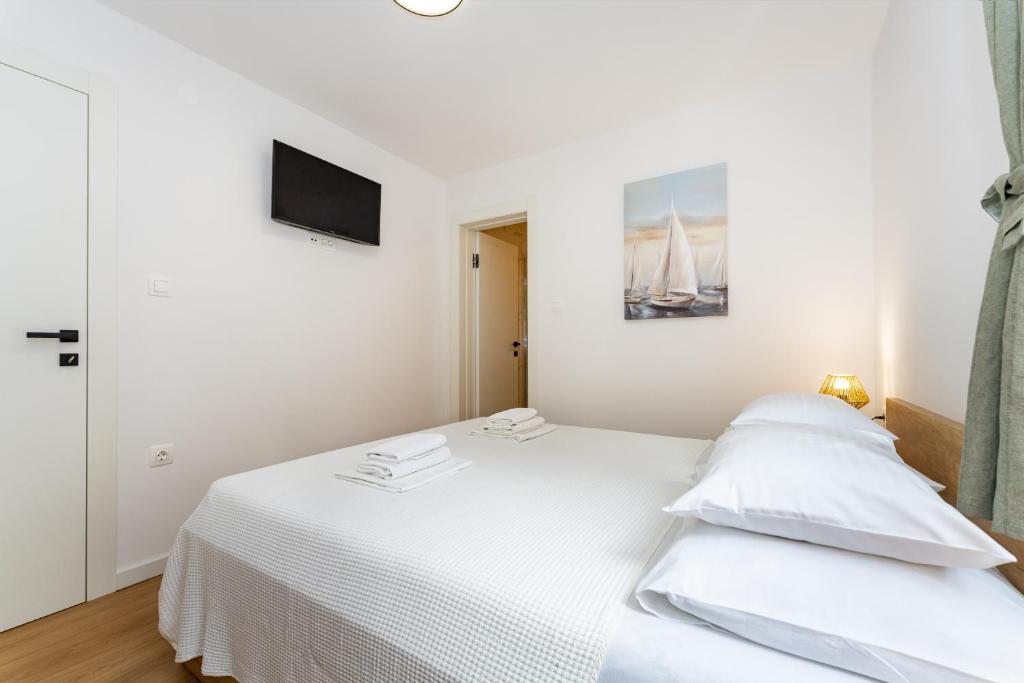 Postel nebo postele na pokoji v ubytování Villa Almaris