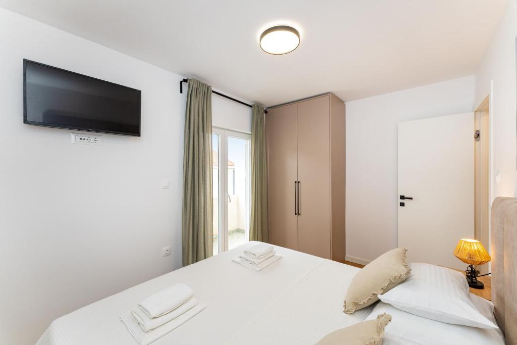 Postel nebo postele na pokoji v ubytování Villa Almaris