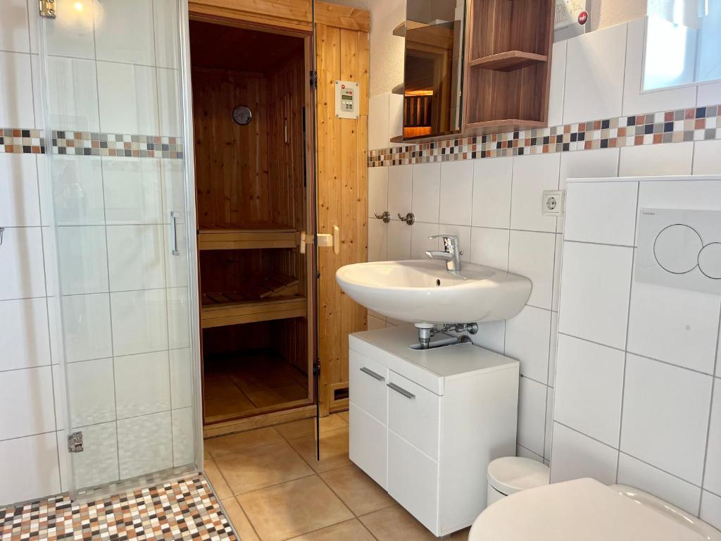 Koupelna v ubytování Feriendorf Südstrand Haus 20