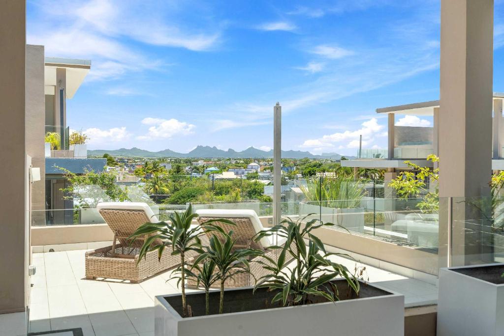 Thumbnail for Cap Off Equatorial Penthouse Apartments