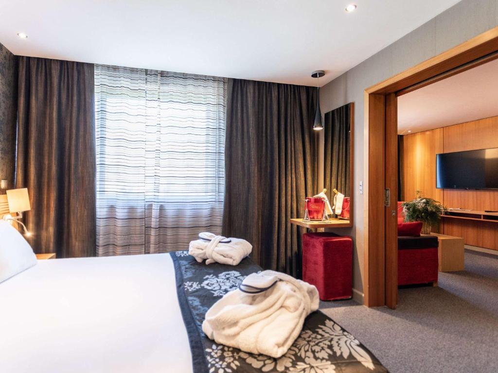 Postel nebo postele na pokoji v ubytování Novotel Valence Sud
