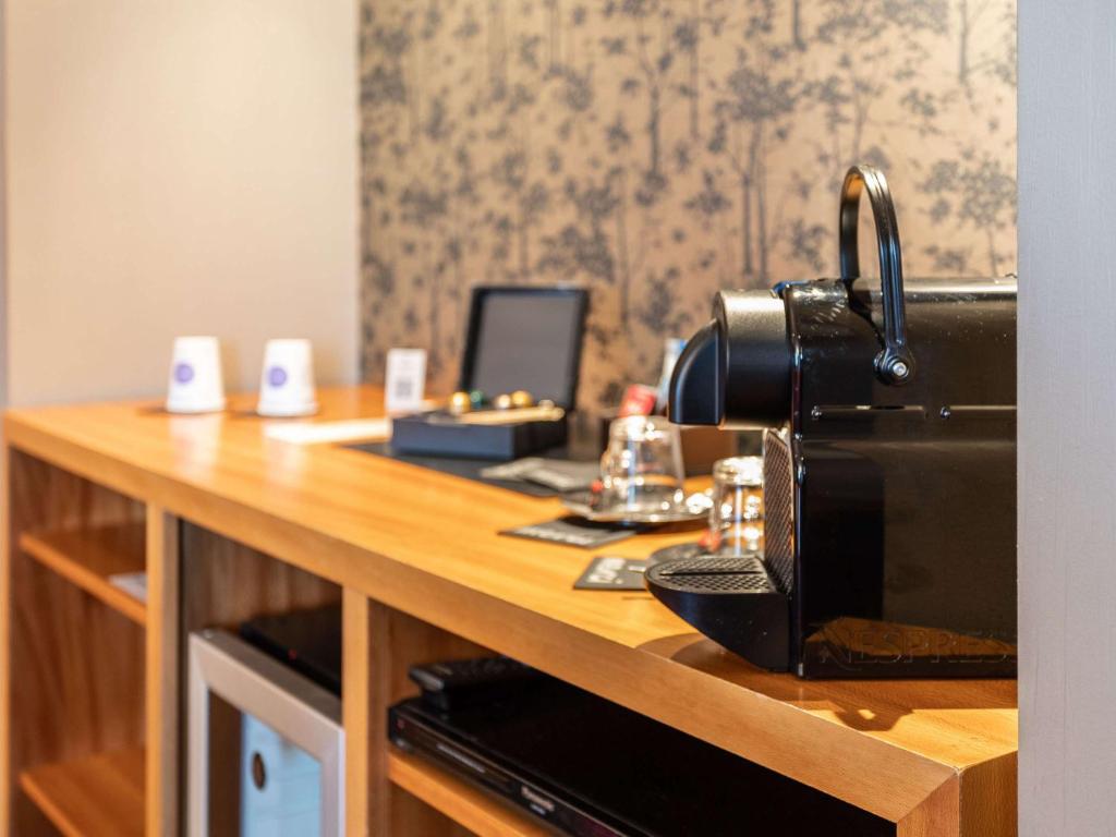 Kuchyň nebo kuchyňský kout v ubytování Novotel Valence Sud