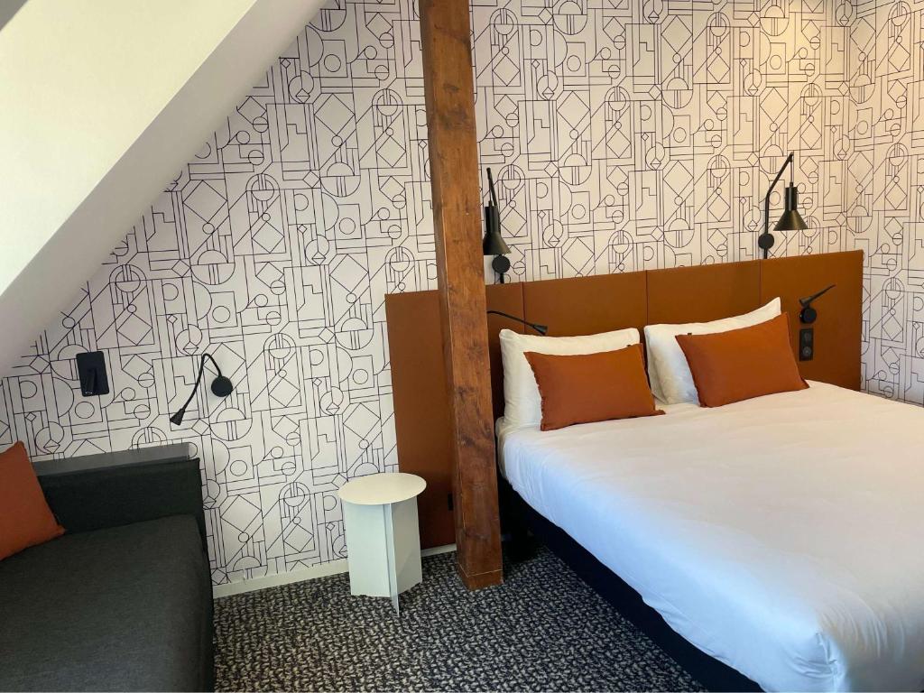 Postel nebo postele na pokoji v ubytování ibis Colmar Centre