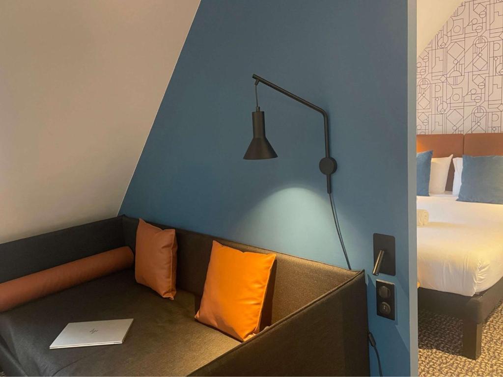 Postel nebo postele na pokoji v ubytování ibis Colmar Centre