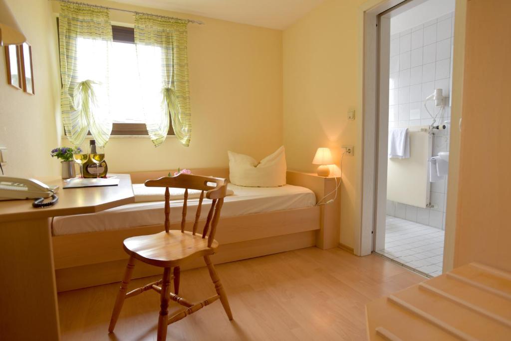 Postel nebo postele na pokoji v ubytování AKZENT Hotel Grüner Baum