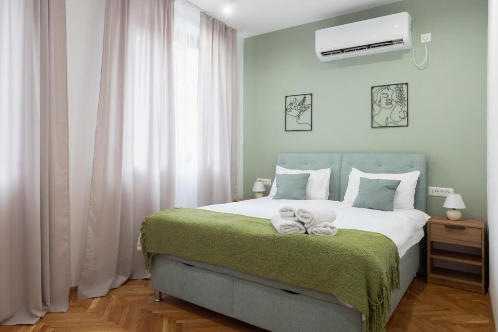 Postel nebo postele na pokoji v ubytování Fera