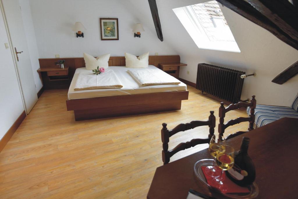 Postel nebo postele na pokoji v ubytování AKZENT Hotel Grüner Baum
