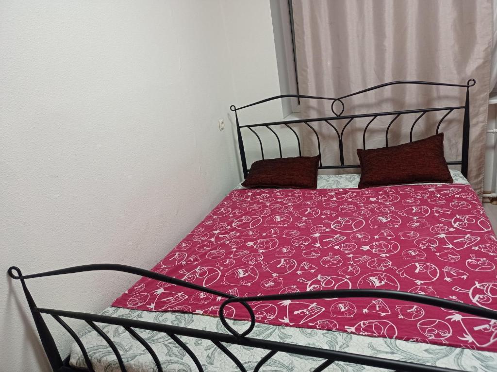 Ένα ή περισσότερα κρεβάτια σε δωμάτιο στο Calm