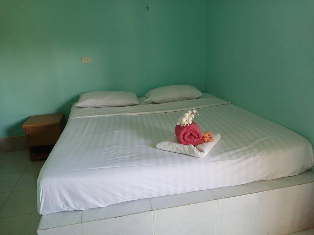 Postel nebo postele na pokoji v ubytování Stella Resort Khanom