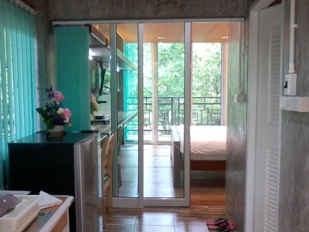 TV a/nebo společenská místnost v ubytování Loei Huen Hao Hug Home&Resort