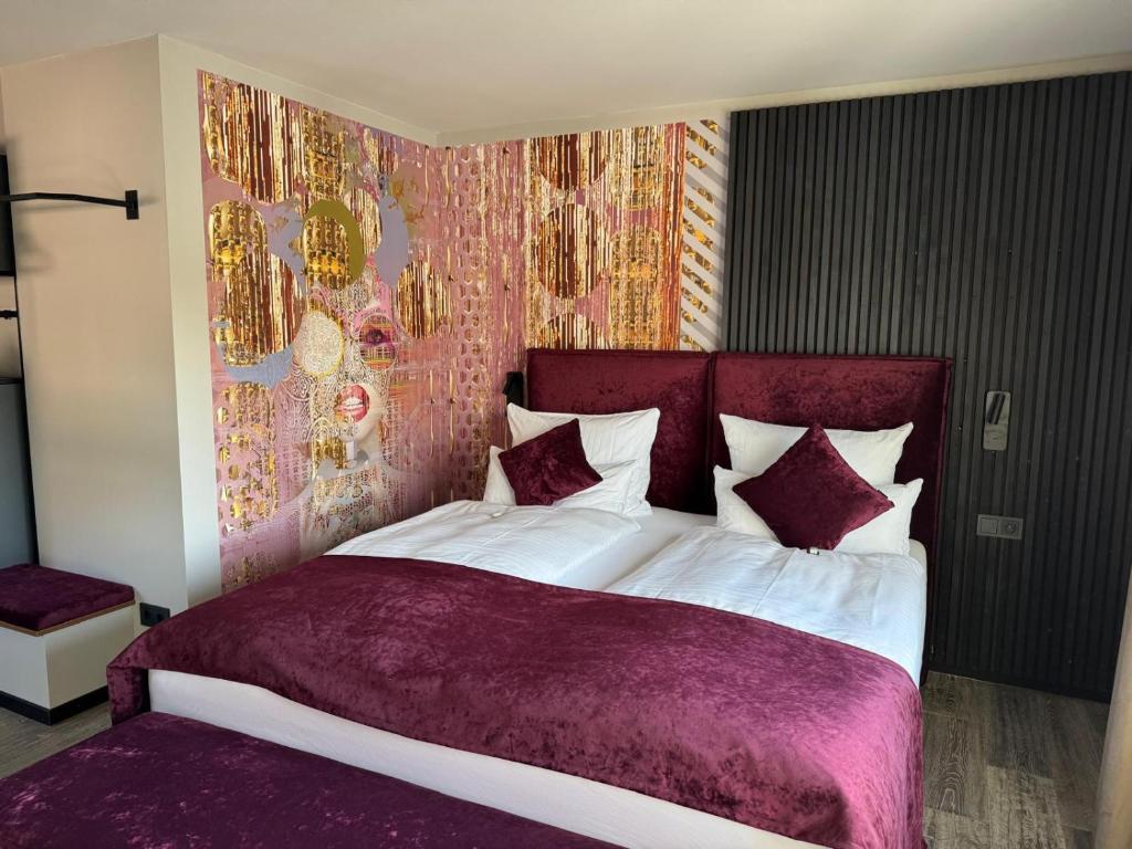 Postel nebo postele na pokoji v ubytování REINHARDTs HOTEL