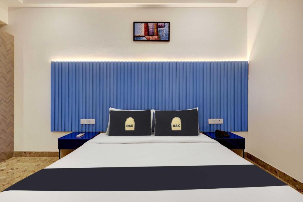 Postel nebo postele na pokoji v ubytování Townhouse OAK Elite Golf Stays