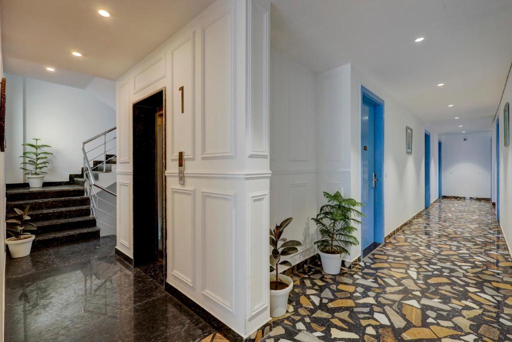 Fotografie z fotogalerie ubytování Townhouse OAK Elite Golf Stays v destinaci Gurgáon