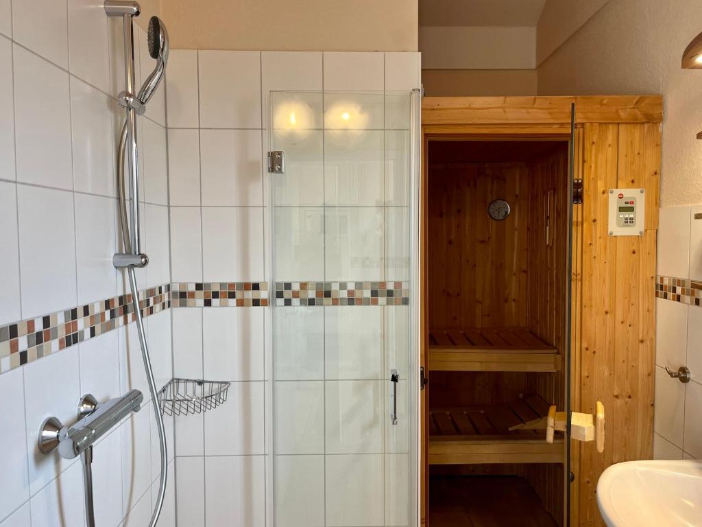 Koupelna v ubytování Feriendorf Südstrand Haus 20