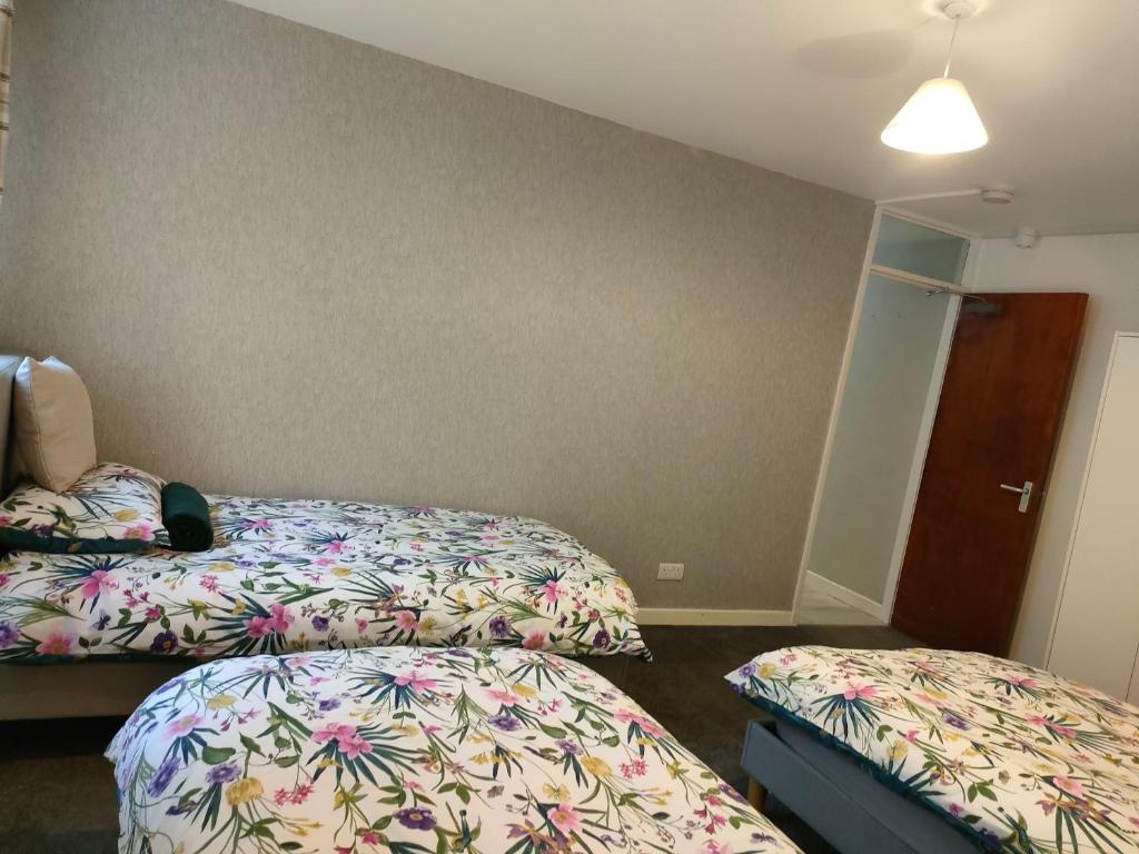 Postel nebo postele na pokoji v ubytování San Remo Apartments Blackpool