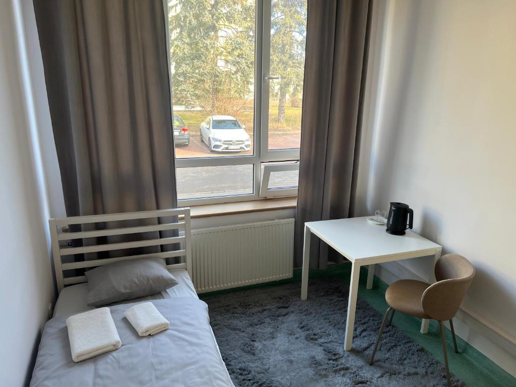 Postel nebo postele na pokoji v ubytování Alliance Hostel
