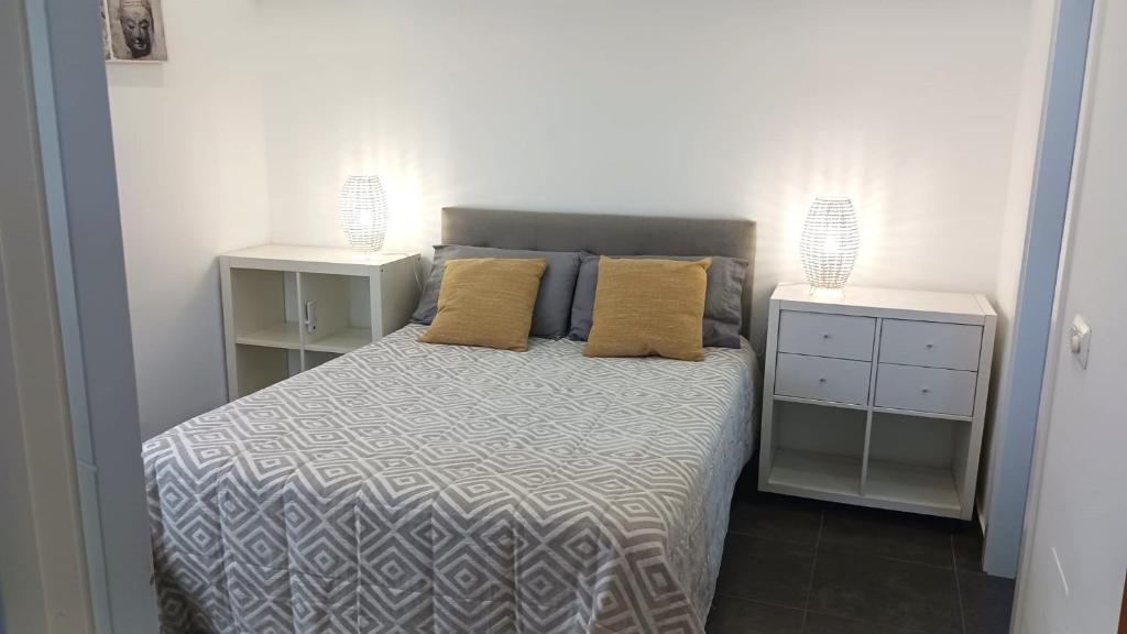 En eller flere senge i et værelse på Rincón del mar