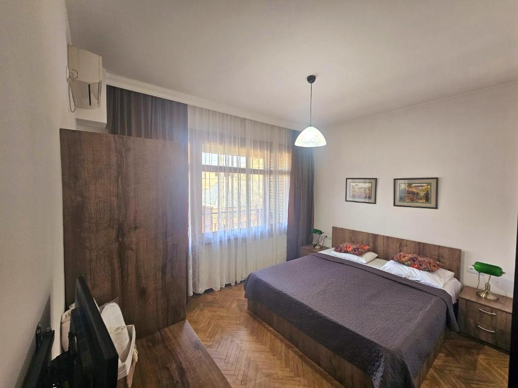 Postel nebo postele na pokoji v ubytování Hotel Home