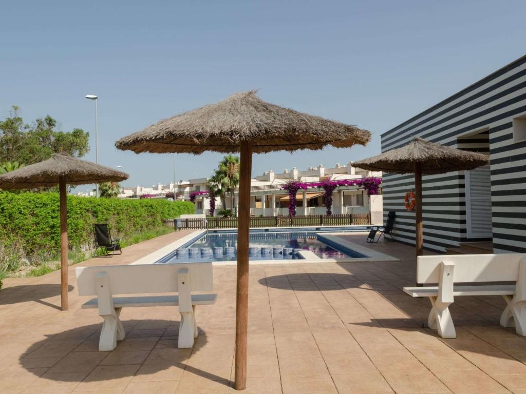 Bazén v ubytování Holiday Home Eucaliptus II by Interhome nebo v jeho okolí