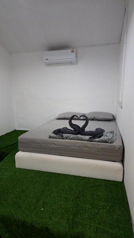 Postel nebo postele na pokoji v ubytování Phangan backpacker