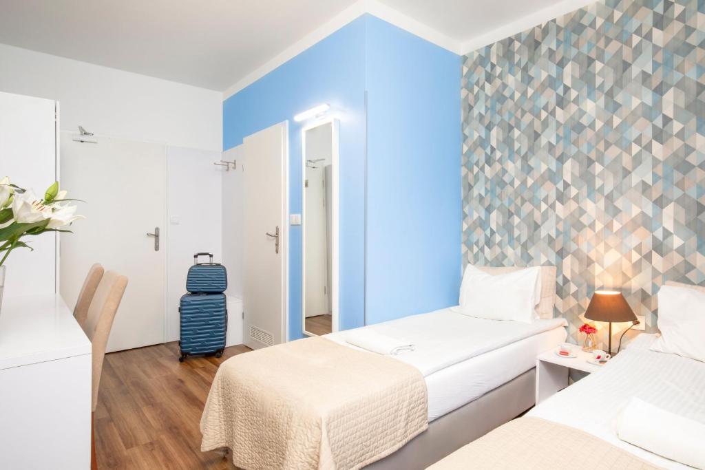 Postel nebo postele na pokoji v ubytování Premium Hostel