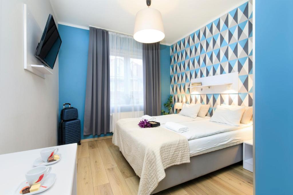 Postel nebo postele na pokoji v ubytování Premium Hostel