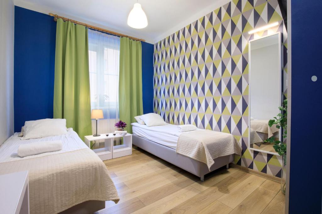 Postel nebo postele na pokoji v ubytování Premium Hostel