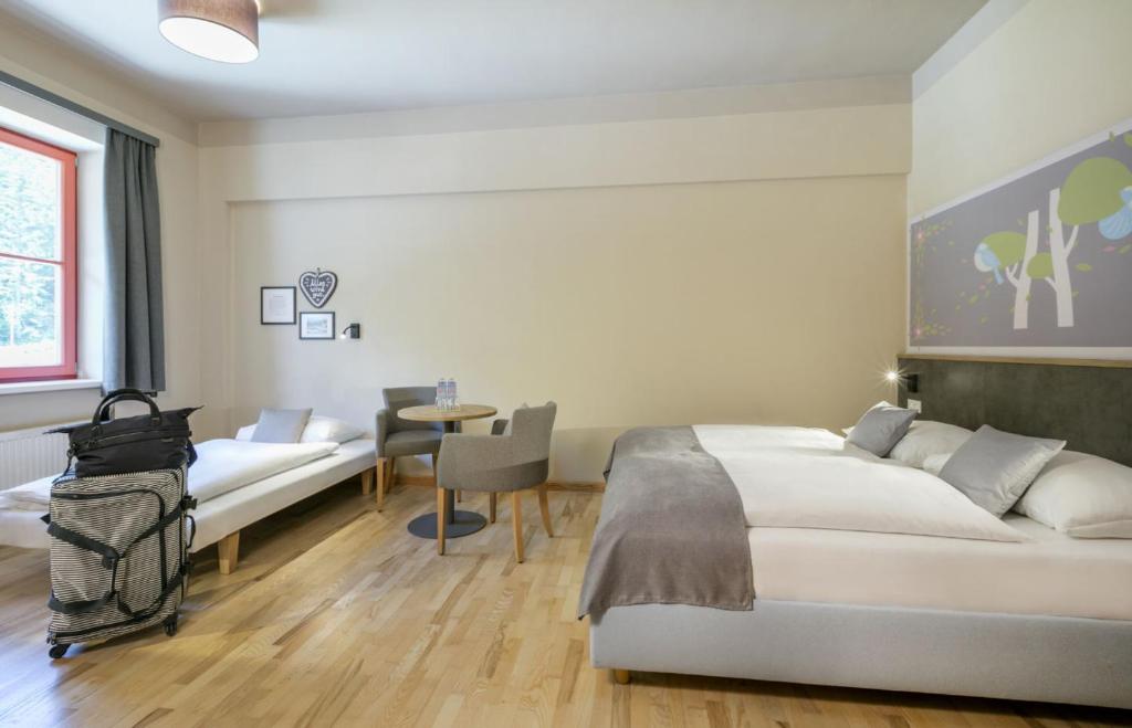 Postel nebo postele na pokoji v ubytování JUFA Hotel Mariazell