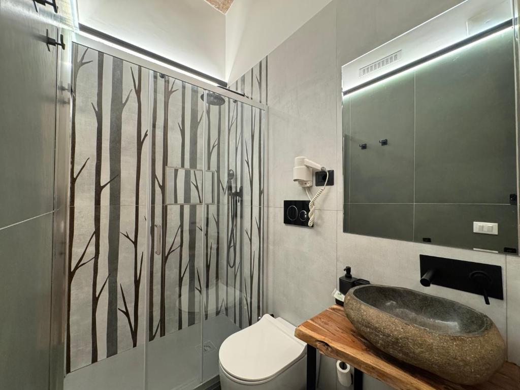 Koupelna v ubytování Hotel Felice