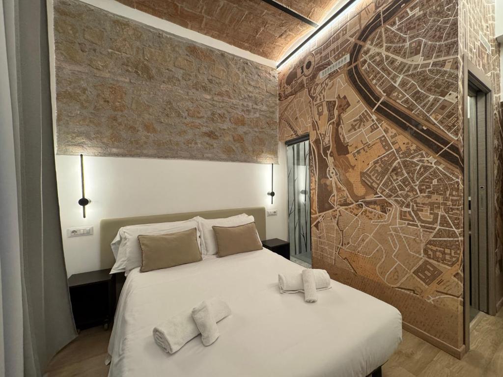 Postel nebo postele na pokoji v ubytování Hotel Felice