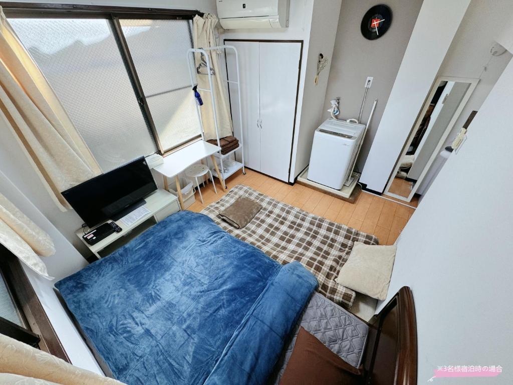 TV a/nebo společenská místnost v ubytování Kawaguchi house