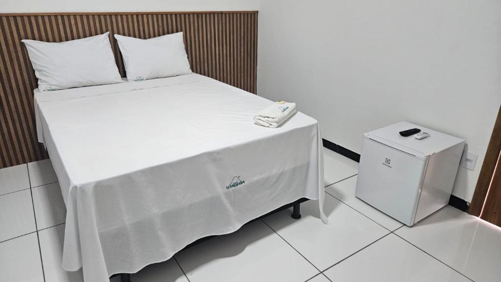 Postel nebo postele na pokoji v ubytování Hotel Itaberaba