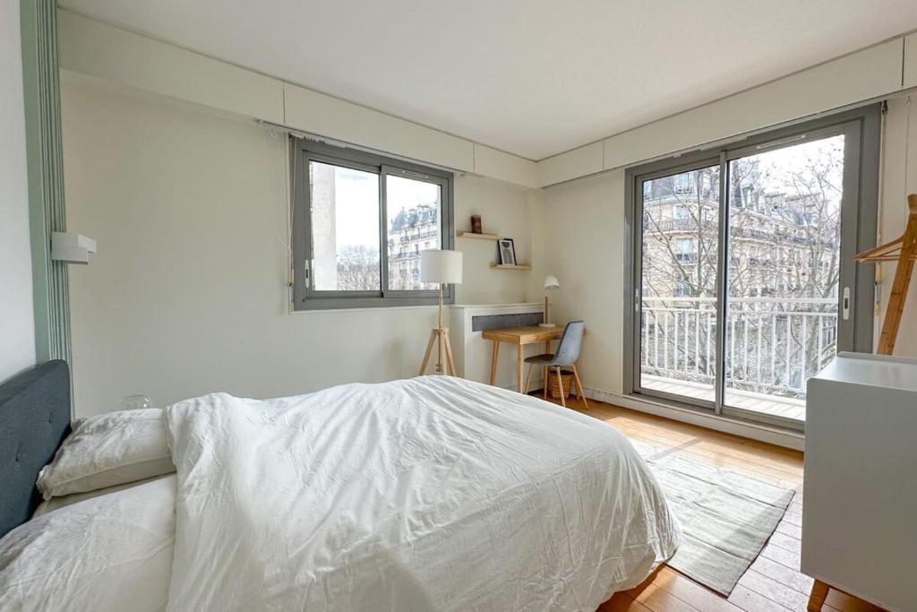 En eller flere senge i et værelse på Flexliving - room - Ternes