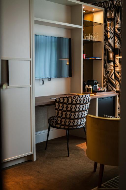 Posezení v ubytování Ambassade Hotel