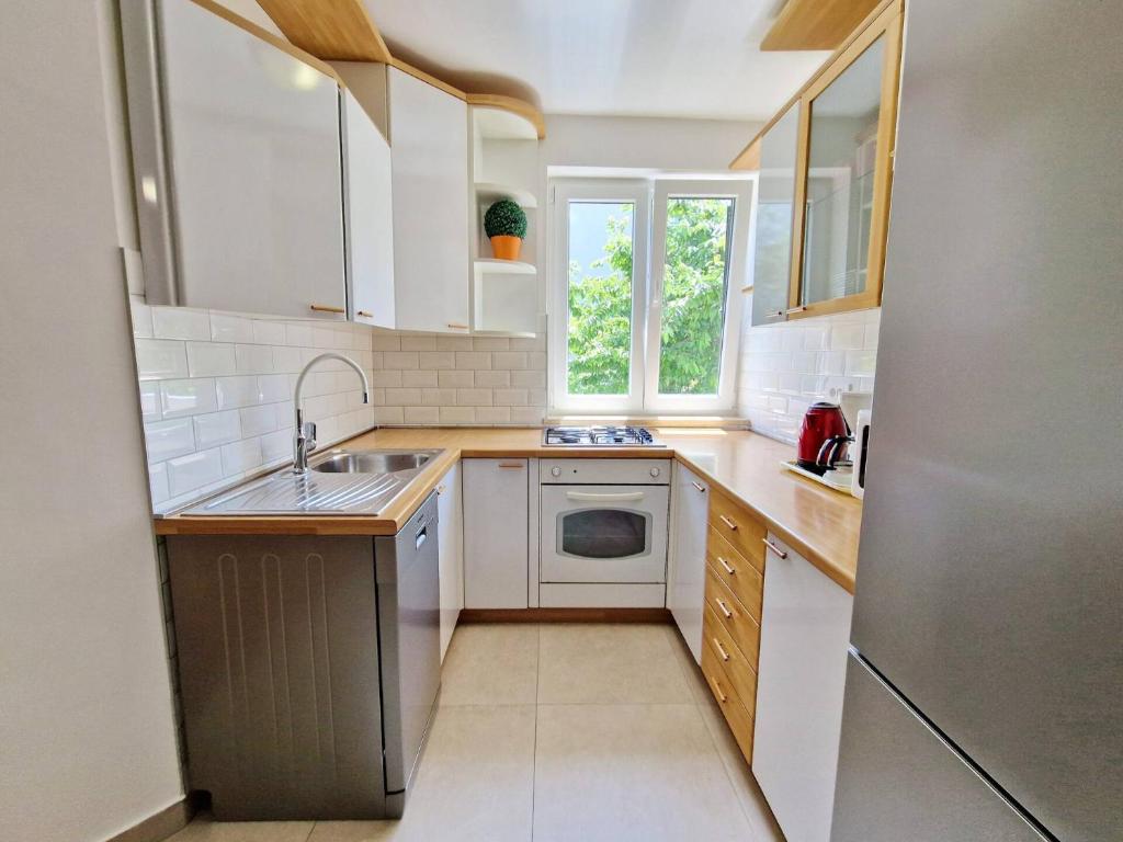 Kuchyňa alebo kuchynka v ubytovaní Apartment Sersic