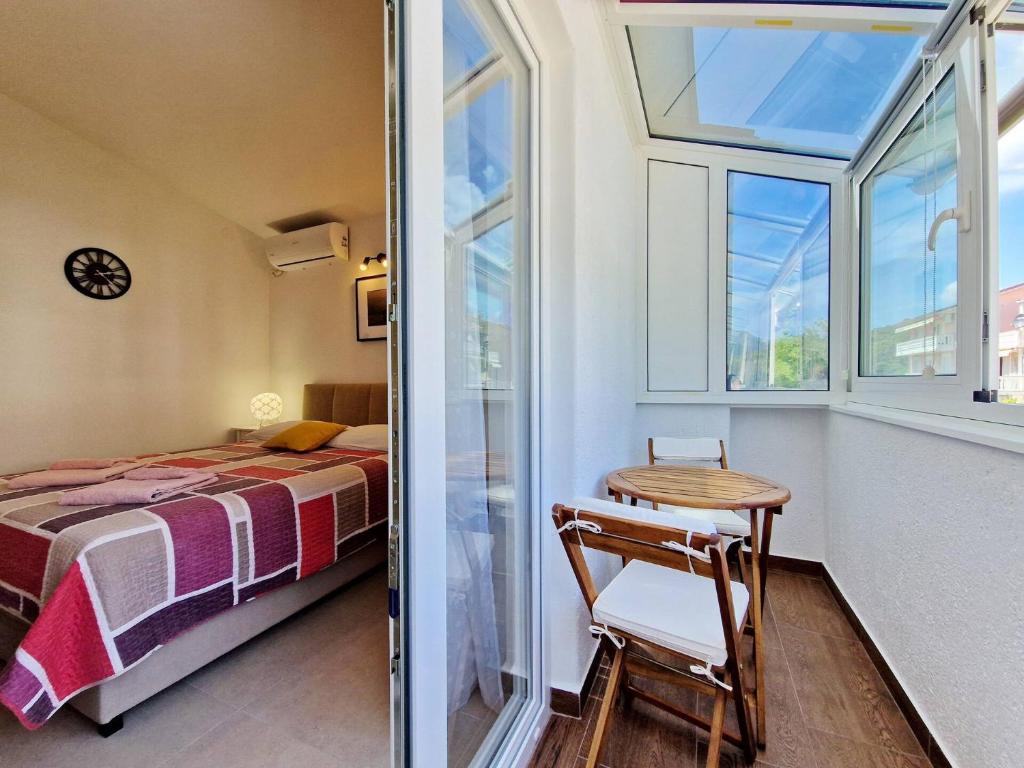 Posteľ alebo postele v izbe v ubytovaní Apartment Sersic