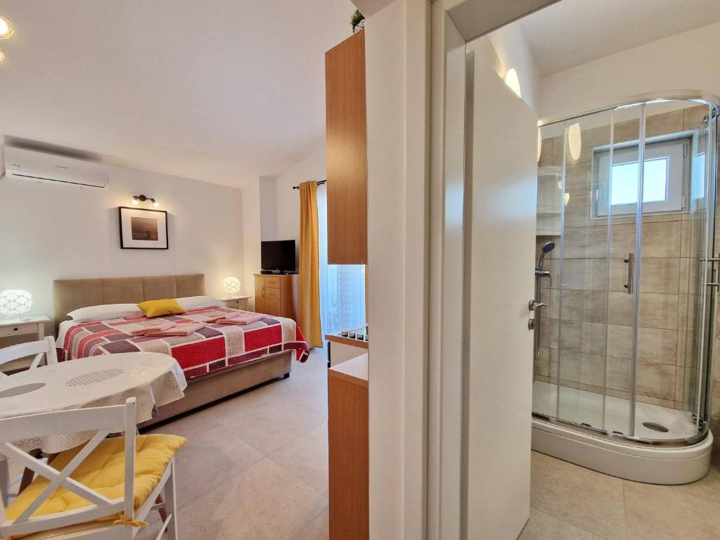 Posteľ alebo postele v izbe v ubytovaní Apartment Sersic